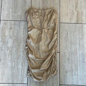 Strapless gold dress.